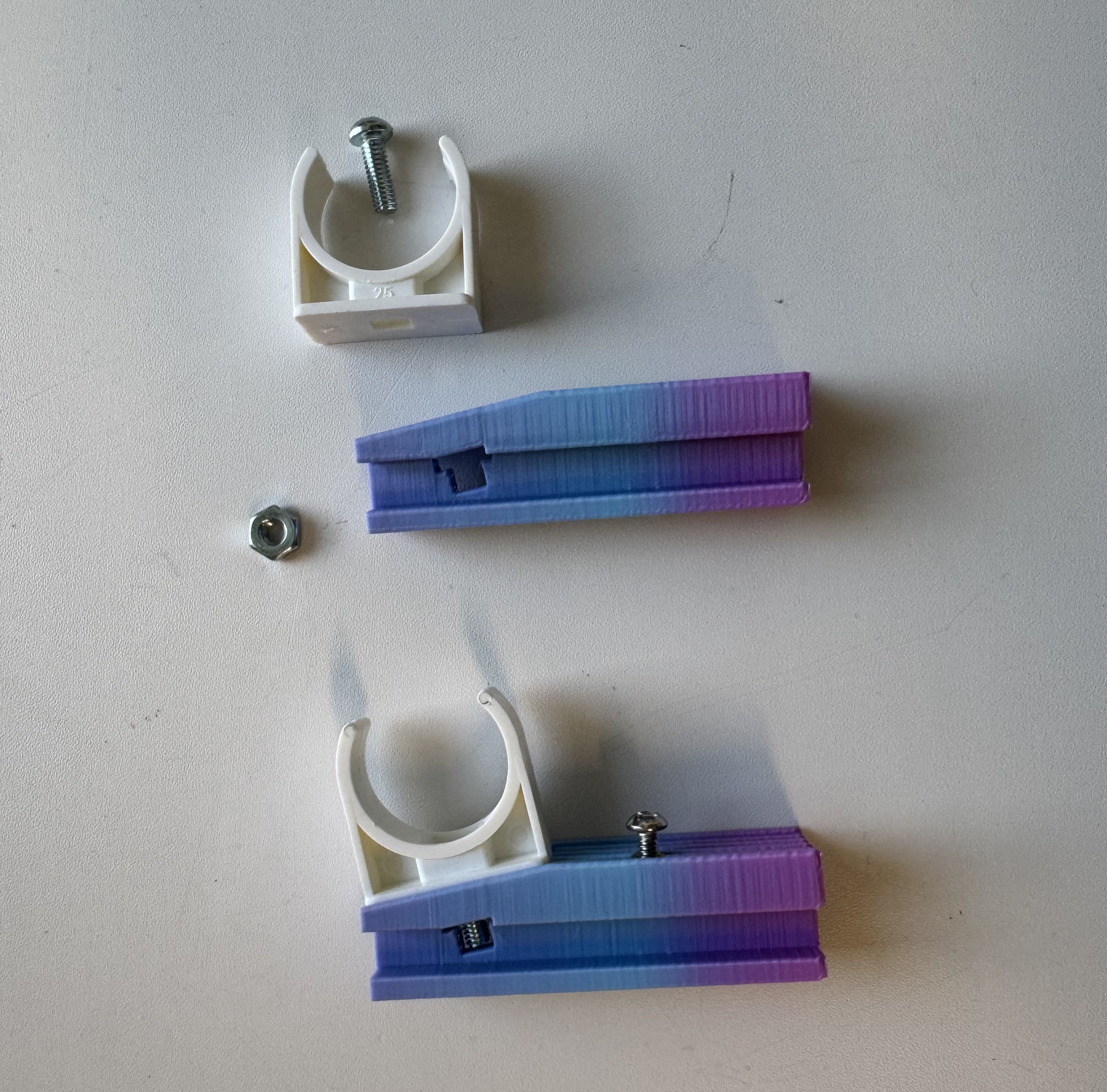 Bowl4All attachment clips for mounting the device to an adaptive bowling ramp